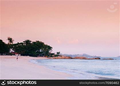 Rock cape summer white sand beach pink tone Sunset or sunrise sky in Samui - Thailand tropical isalnd beautiful nature scenery in evening or morning