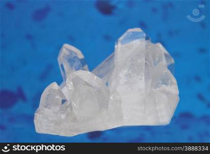 Rock crystal on blue