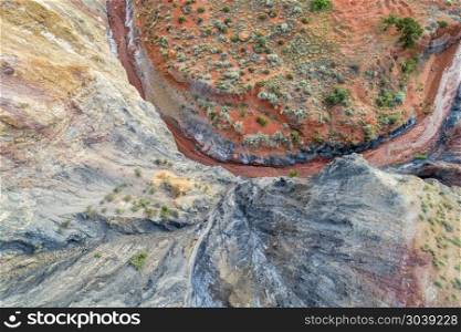 rock formation and creek - aerial view. Aerial view of colorful rock formation and steep cliff along Onion Creek in Moab area, Utah