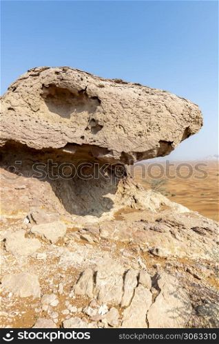 Rock formation in the desert, Pink Rock, Sharjah, United Arab Emirates, UAE, Middle East, Arabian Peninsula. Rock in the desert, Pink Rock, Sharjah, UAE