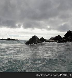 Rock formations in the Pacific Ocean, Playa Ochoa, San Cristobal Island, Galapagos Islands, Ecuador