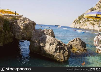 Rock formations in the sea, Capri, Campania, Italy