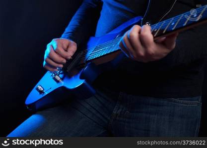 rock guitarist with blue guitar