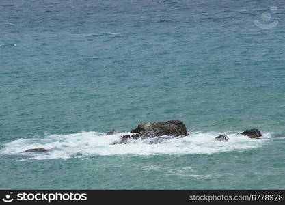 Rock in the sea in Crimea .