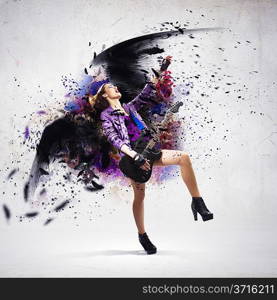 Rock passionate girl with black wings