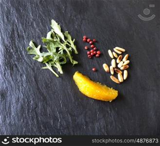 Rocket salad ingredients orange, pepper, arugula, pine nuts&#xA;
