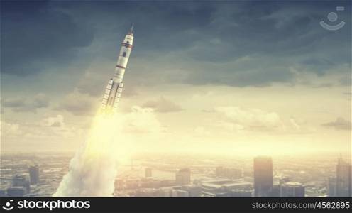 Rocket Space Ship. Military missile flying high in blue sky
