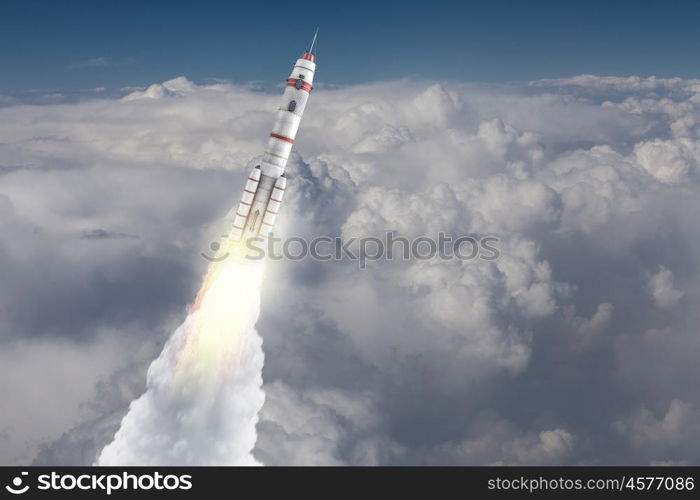 Rocket Space Ship. Military missile flying high in blue sky