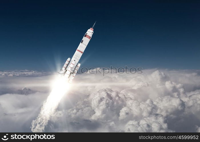 Rocket Space Ship. Military missile flying high in blue sky