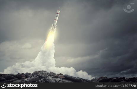 Rocket Space Ship. Military missile flying high in blue sky