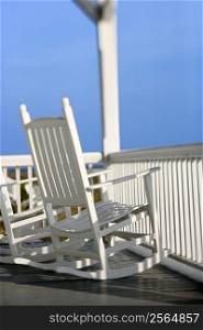 Rocking chairs on porch on Bald Head Island, North Carolina.