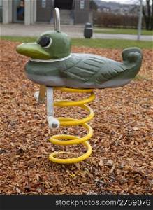 Rocking seat toy in the playground for kids
