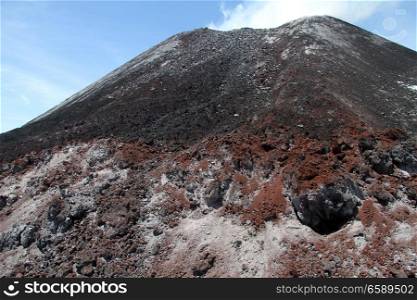 Rocks and peak of volcano Krakatau in Indonesia