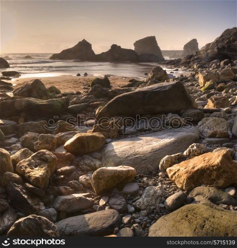Rocks and pebbles at Bedrutahn Steps, Cornwall, England.