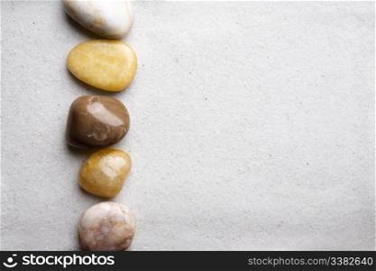 Rocks and sand on a beach style background
