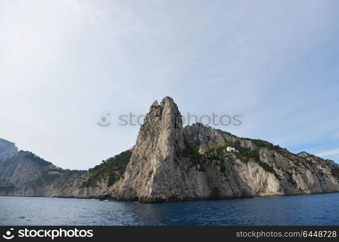 Rocks and sea under blue sky