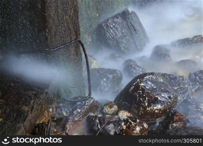 Rocks and water from a waterfall
