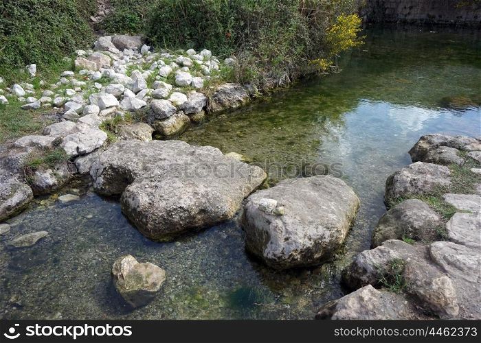 Rocks and water from Ein Ivka spring, Israel