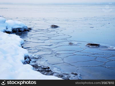 Rocks at icy coast