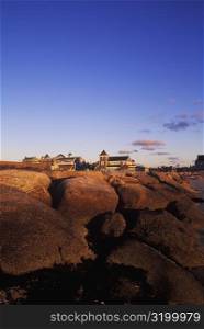 Rocks in front of buildings, Cape Cod, Massachusetts, USA