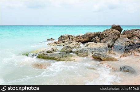 Rocks in the caribbean sea on Aruba island