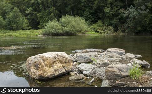 rocks in the river semois in belgium ardennes