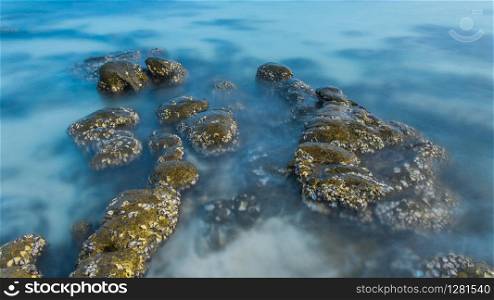 Rocks in the Water, Long exposure. Rocks in the Water, Long exposure, color contrast