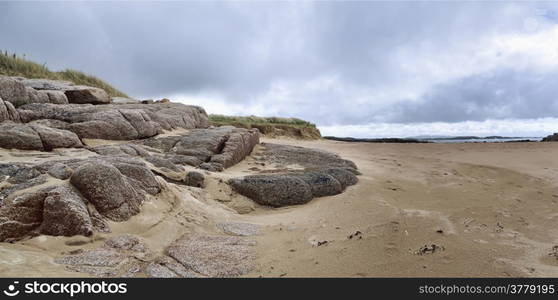 Rocks of red granite. Cruit Island (Irish: An Chruit or Oilean na Cruite) is a small inhabited island in the Rosses region of County Donegal, Ireland