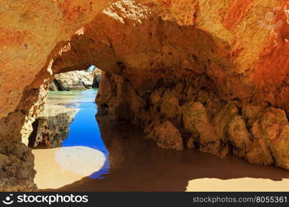 Rocks on sandy beach Dos Tres Irmaos(Portimao, Alvor, Algarve, Portugal).