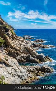 Rocks on the coast of Lloret de Mar in a beautiful summer day, Costa Brava, Catalonia, Spain