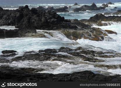 rocks on the coast with ocean waves&#xA;