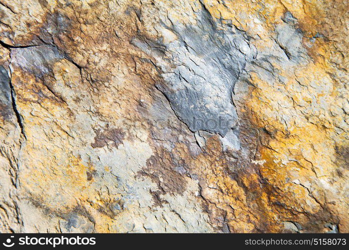 rocks stone and red orange gneiss in the wall of morocco