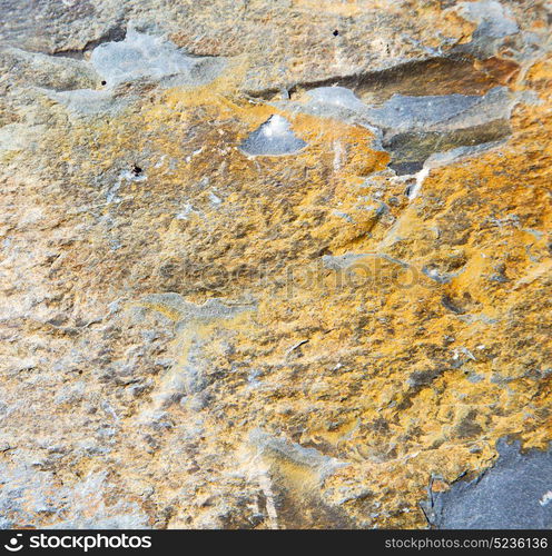 rocks stone and red orange gneiss in the wall of morocco