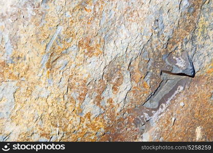 rocks stone and red orange gneiss in the wall of morocco