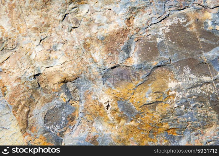 rocks stone and red orange gneiss in the wall of morocco