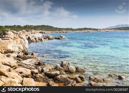rocks with beautifull bay with blue water on maddalena island, near sardinia, you can reach the island with the ferry from the sardinia palce palau. La Maddalena village in La Maddalena island, Sardinia, Italy. La Maddalena village in La Maddalena island, Sardinia, Italy