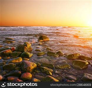 Rocky beach on a sunset.
