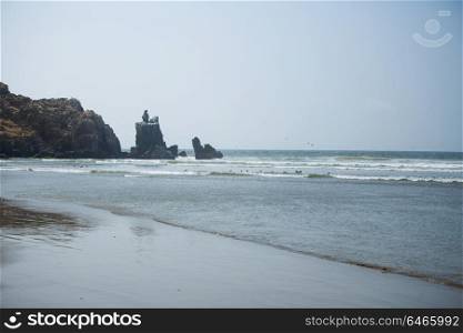 rocky coast along the ocean. Peru