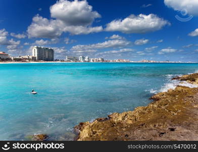 Rocky coast, the sea and city in the distance