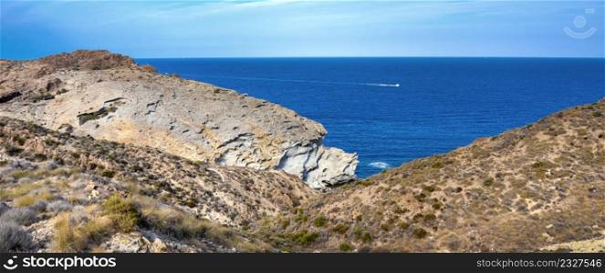 Rocky Coastline and Cliffs, Los Escullos, Cabo de Gata-Nijar Natural Park, UNESCO Biosphere Reserve, Hot Desert Climate Region, Almeria, Andalucia, Spain, Europe