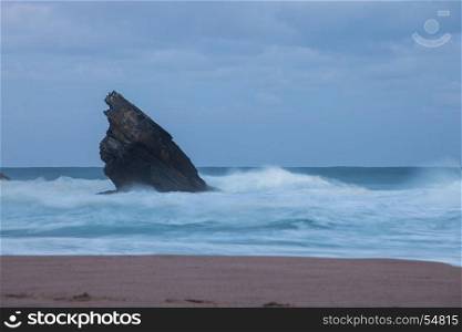Rocky coastline of Adraga beach, Portugal