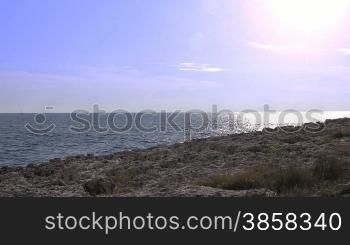 Rocky coastline of Kamenjak cape, rippling water surface