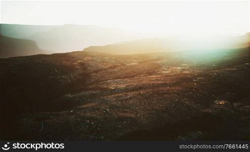 rocky desert at dramatic sunrise