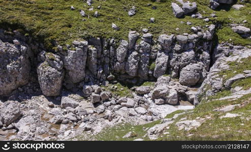 Rocky formations and grassy lands