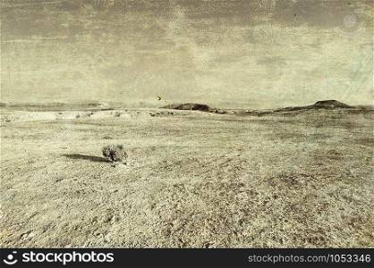 Rocky hills of the Negev Desert in Israel. Wind carved rock formations in the Southern Israel Desert. Vintage style toned picture