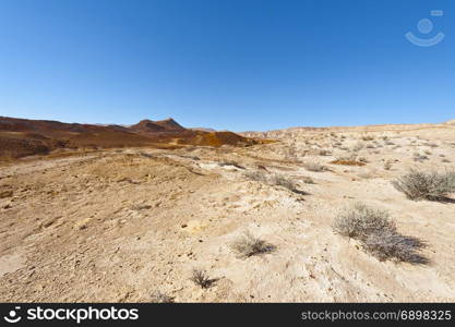 Rocky hills of the Negev Desert in Israel. Breathtaking landscape of the desert rock formations in the Southern Israel Desert.