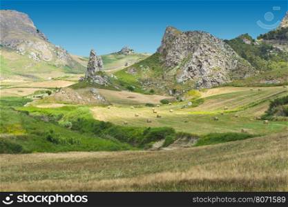 Rocky Landscape of Sicily with Many Hay Bales