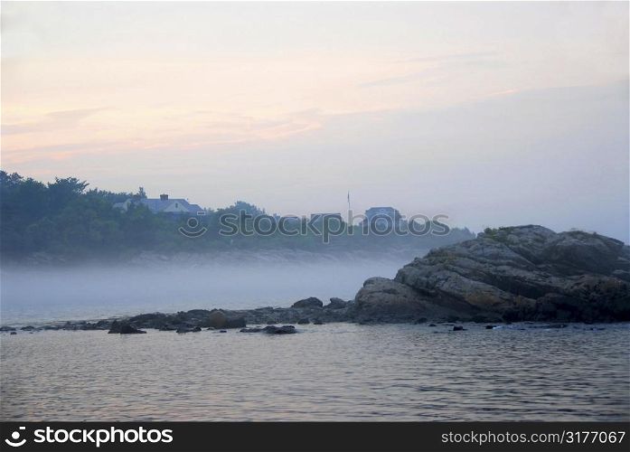 Rocky misty coast of Atlantic ocean in Maine, USA