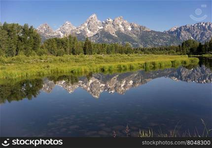 Rocky Mountain Range Reflected Smooth Water Grand Teton National Park