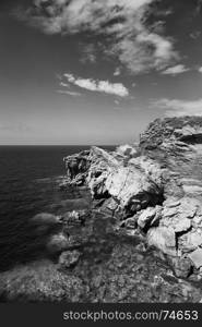 Rocky seashore of Crete Island in b&w, Greece